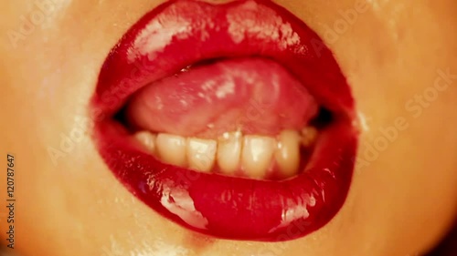 Hot Woman Sexual Licking Her Red Wet Lips Stock Footage