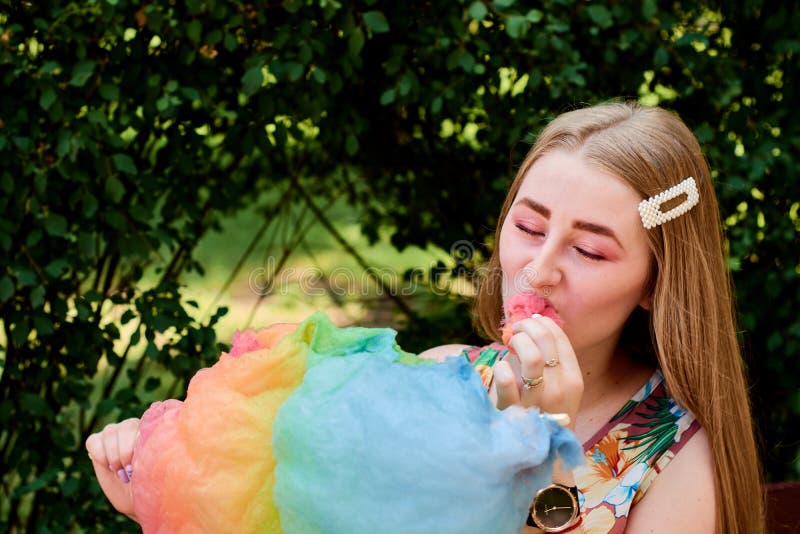Happy Joyful Beautiful Young Woman With Candy Floss In The Park At