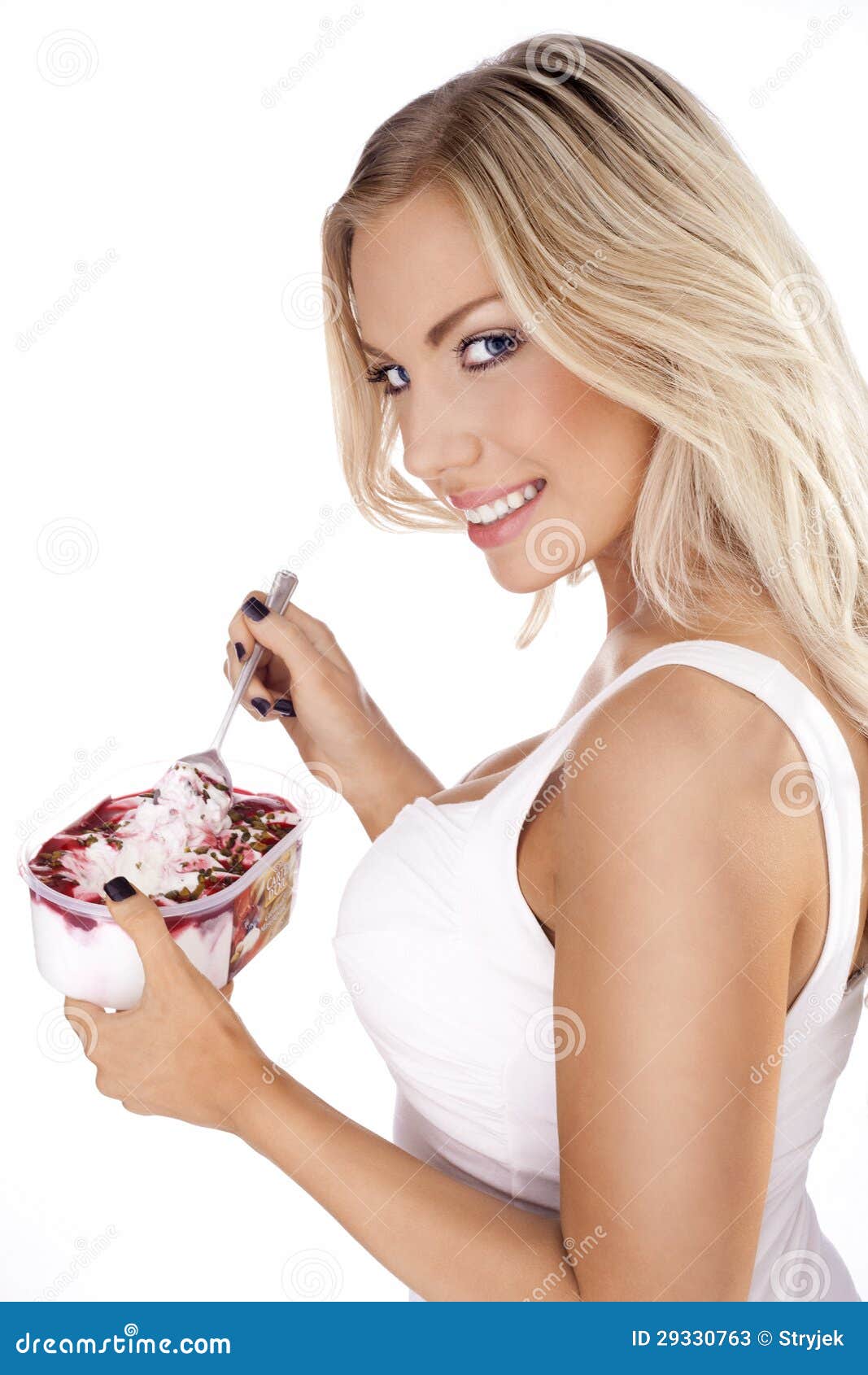 Beautiful Blonde Enjoying A Delicious Dessert Stock Image