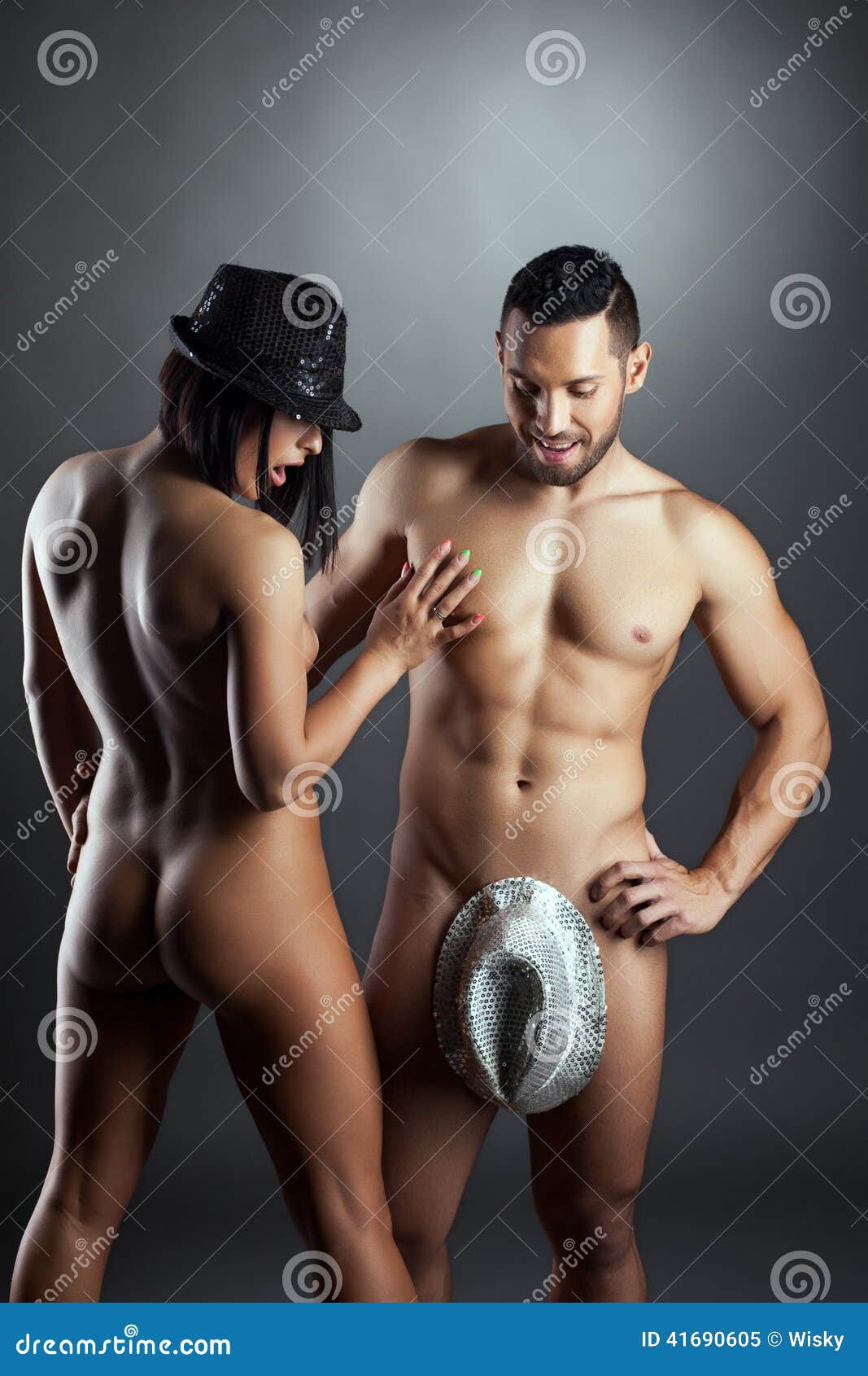 Surprised Nude Woman Looking At Man Dressed In Hat Stock