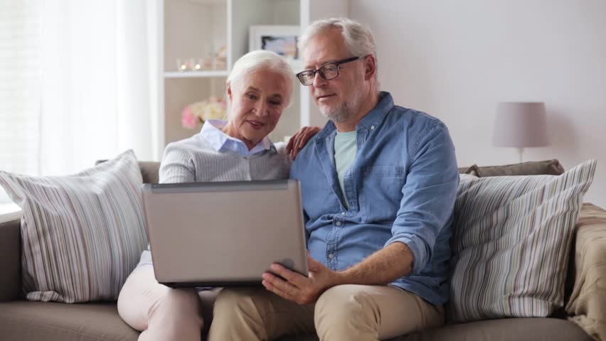 Old Man And Woman Having A Conversation With Laptop 4k
