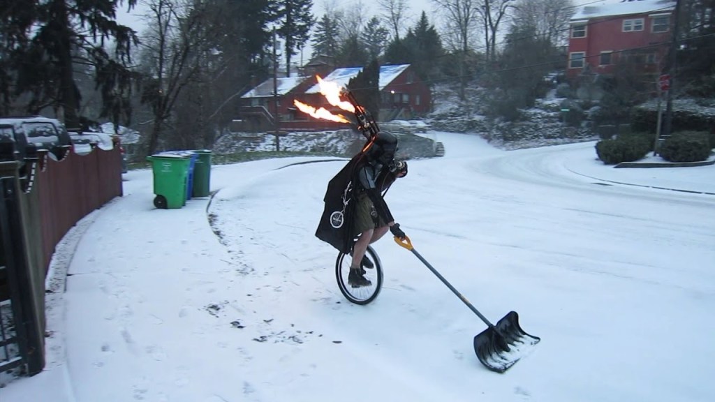 The Unipiper Dresses As Darth Vader And Shovels Snow While